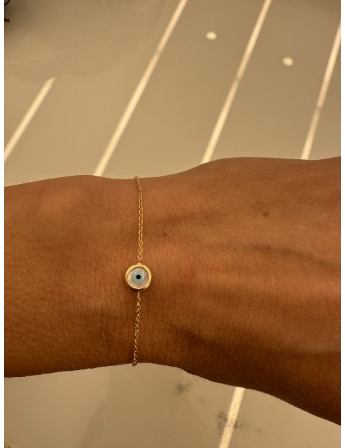 Gold bracelet with evil eye